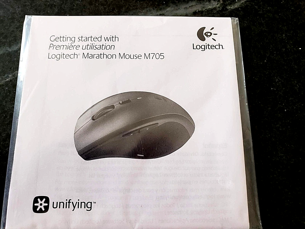 Assorted Software CDs & Logitech Manual (Windows 7, Word Perfect & Linksys)