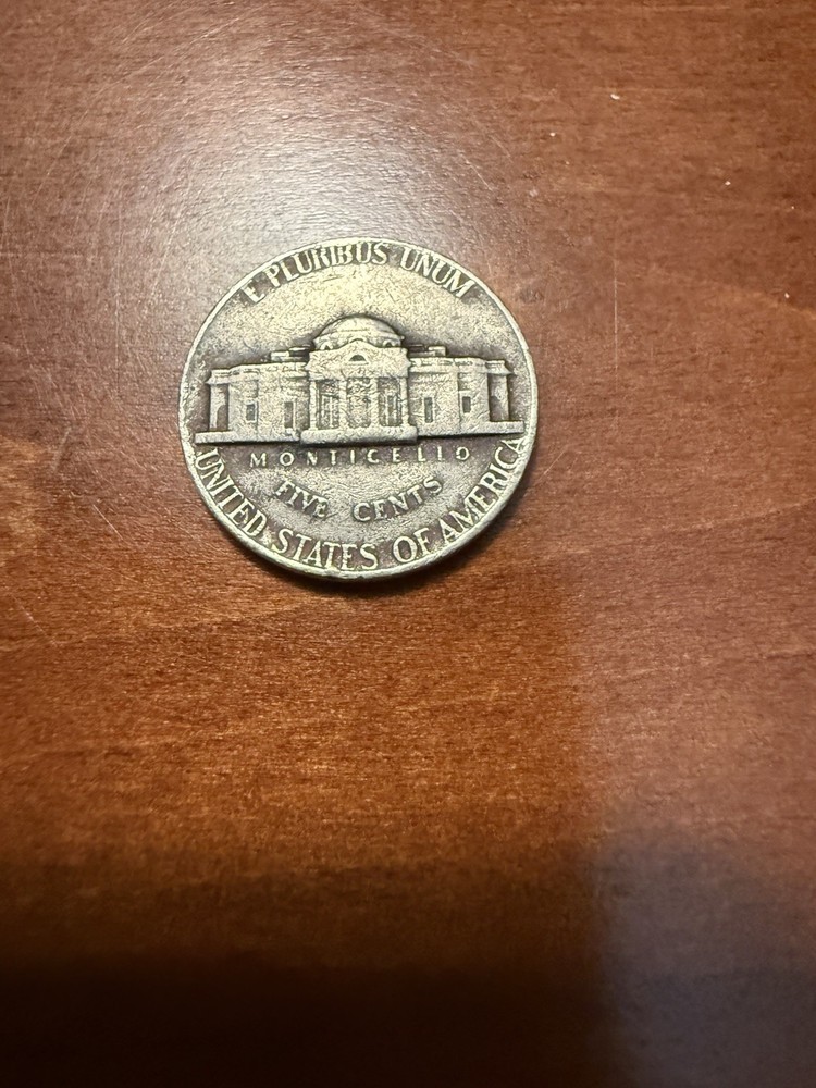1975 D Nickel with high misplaced mint mark