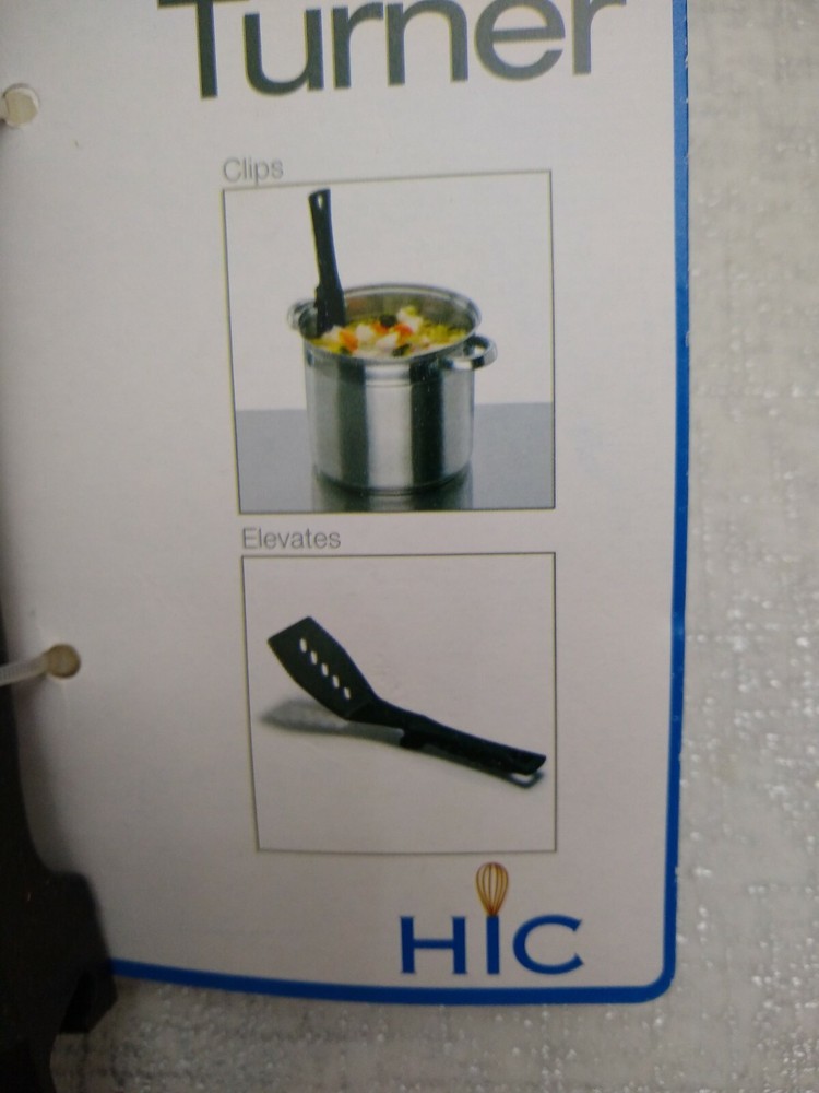 Hic serrated turner , black plastic ,pot hook