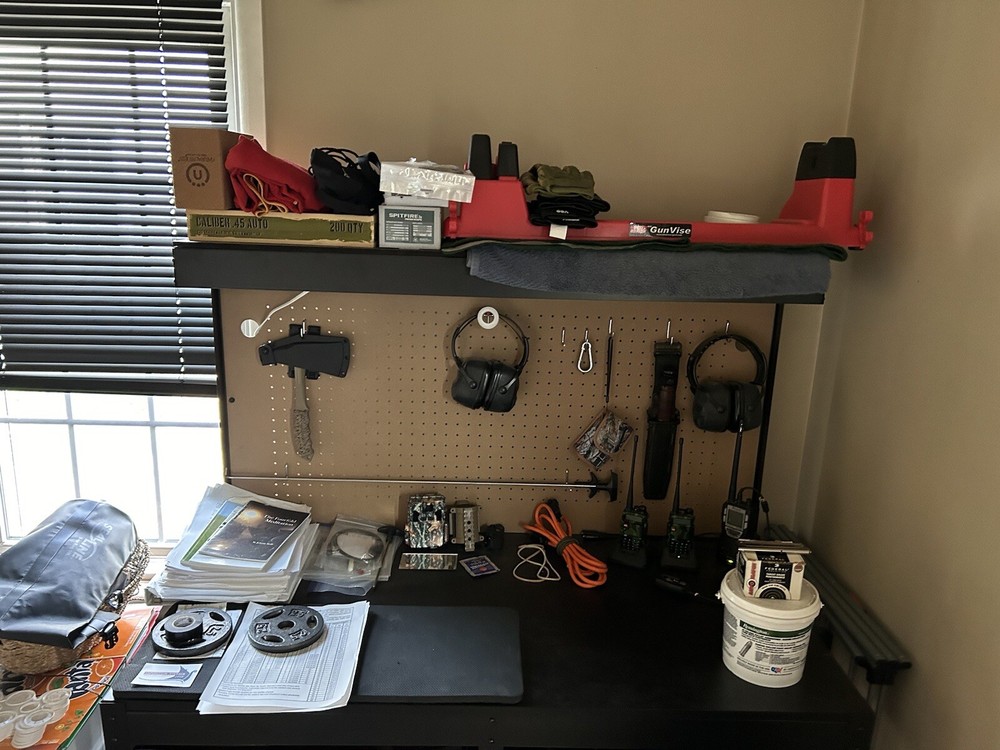 Work Bench With Pegboard Back And Overhead Light.