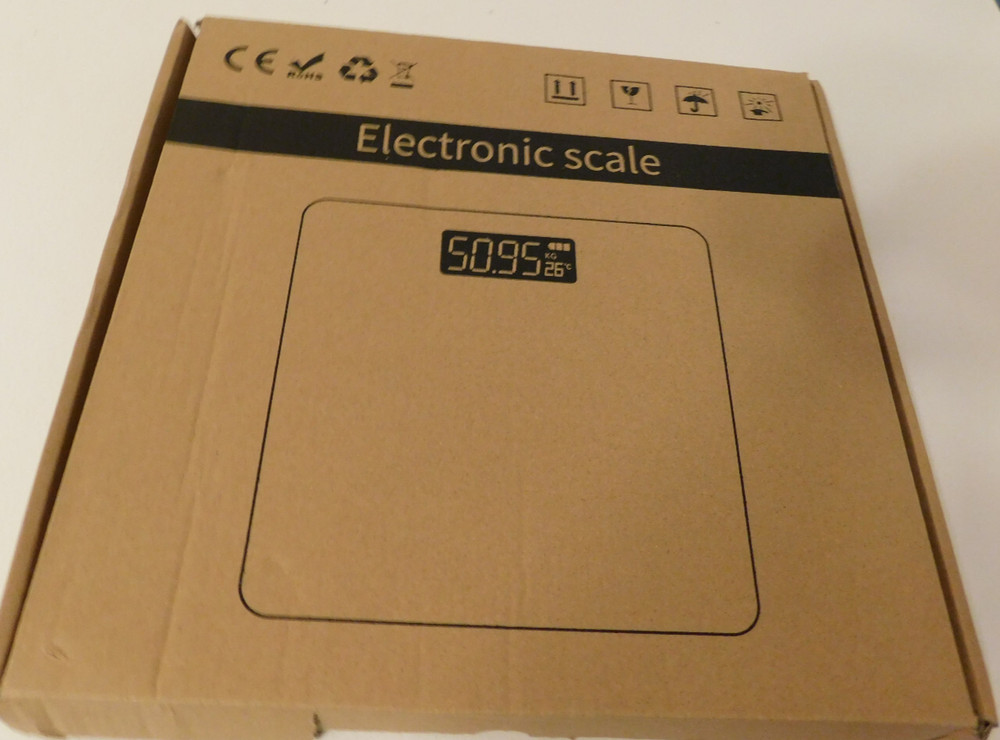 NEW IN BOX ELECTRONIC SCALE--BATTERIES INCLUDED