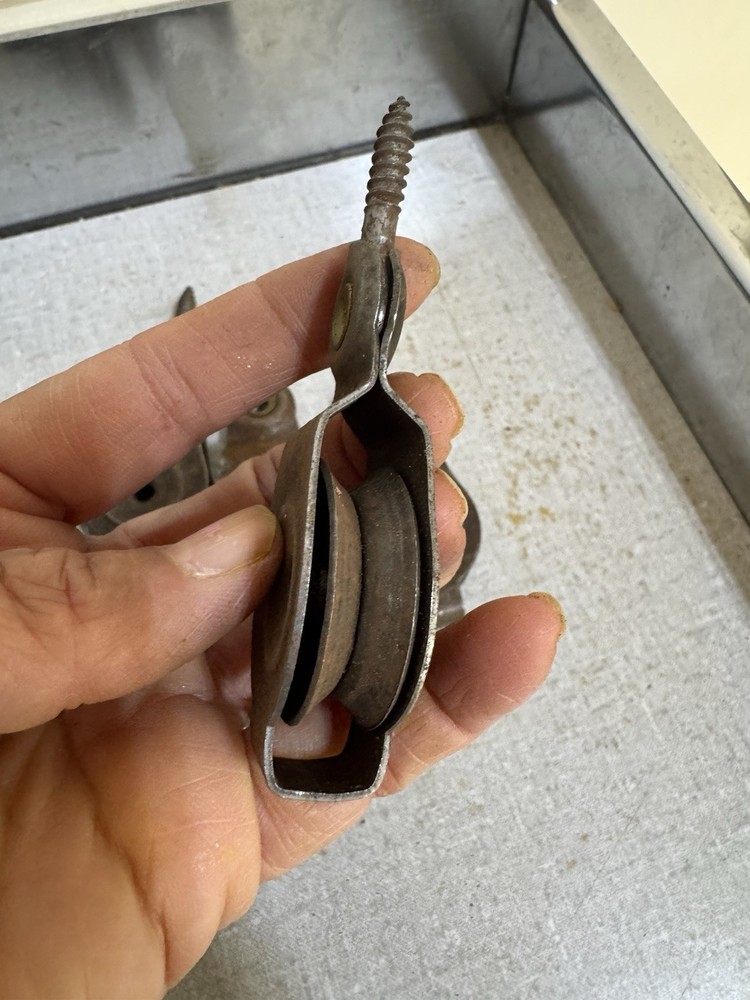 4 vintage small metal block pulleys