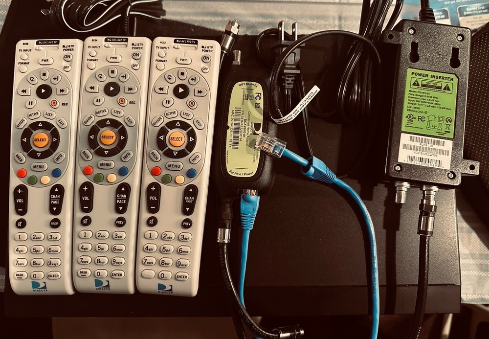 Two tv receivers Three Remote One Connected Adapter One Power Inserted