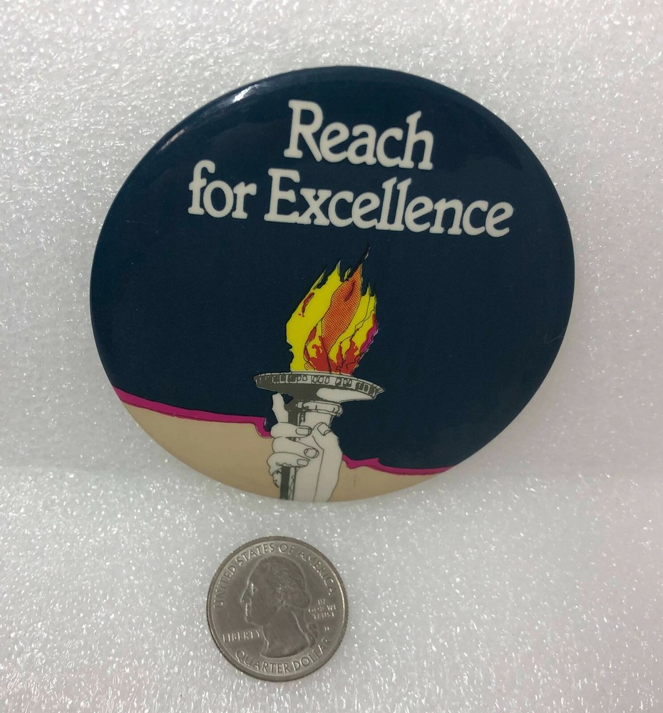 Reach For Excellence Torch Pin