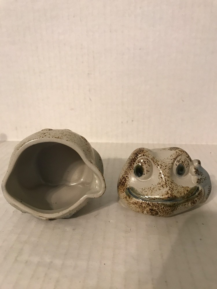 TAN AND BROWN GLAZED POTTERY FROG SHAPED JAR