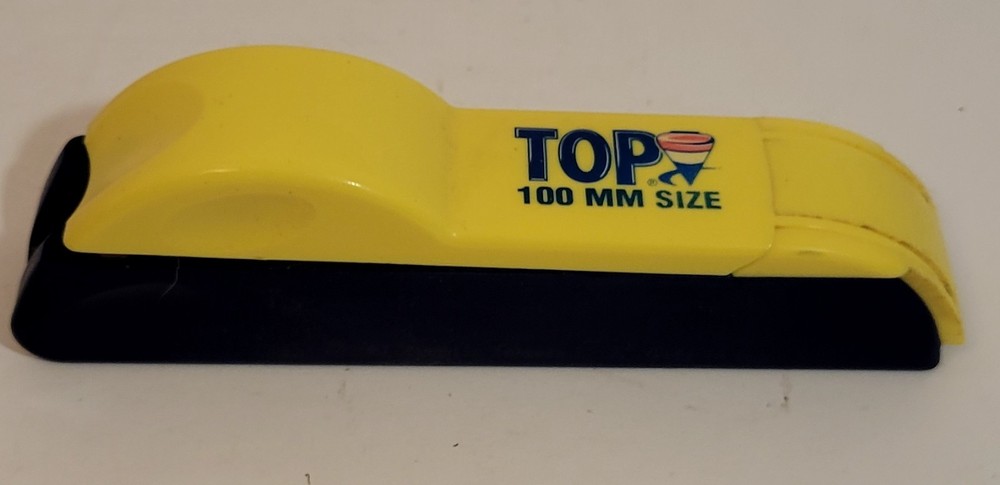 Top Cigarette machine, unused in box.