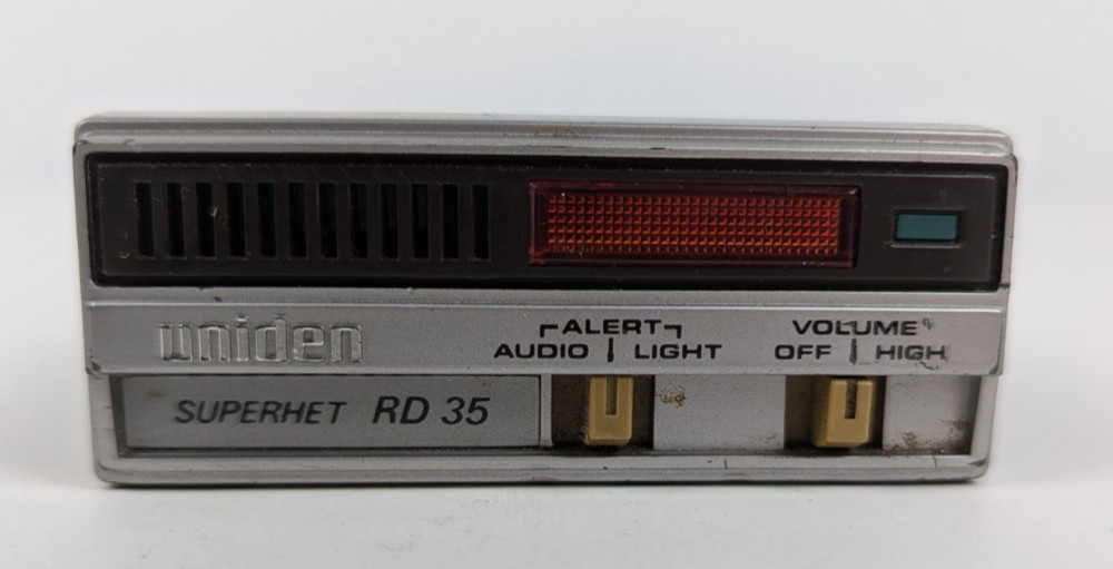 UNIDEN RD-35 RADAR DETECTOR - BRACKET & CIG CORD- POWERS ON (otherwise UNTESTED)