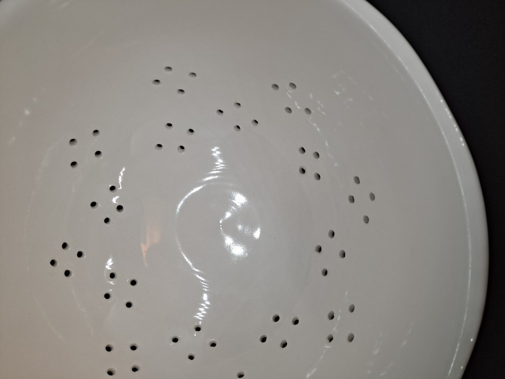 Rae Dunn Colander "Organic" printed on front white ceramic