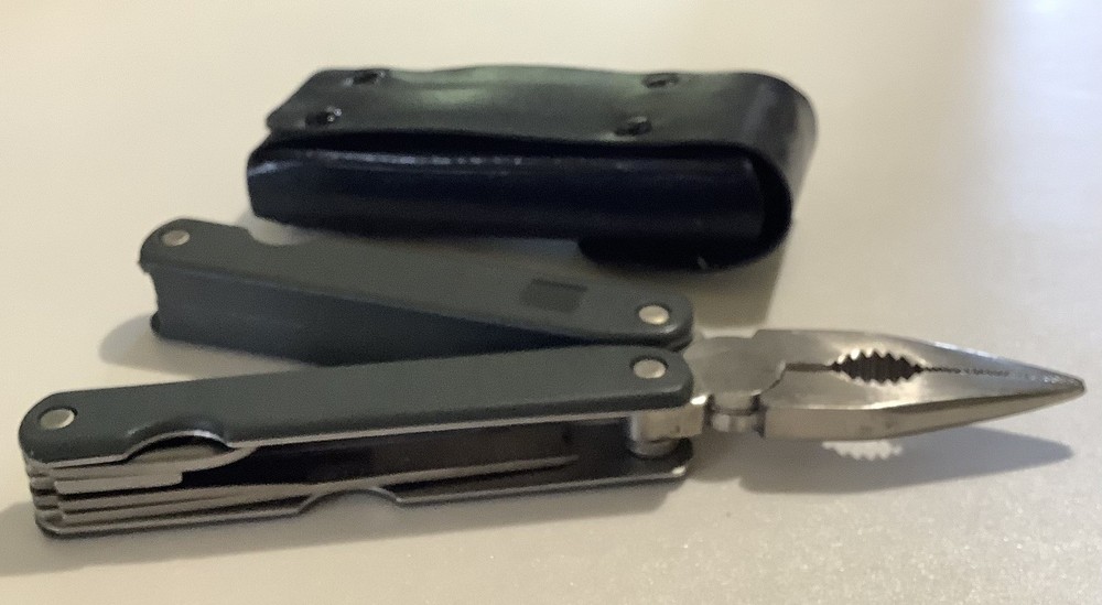 SALE $8 Multitool 8 Function Black Handle Not Branded In Case