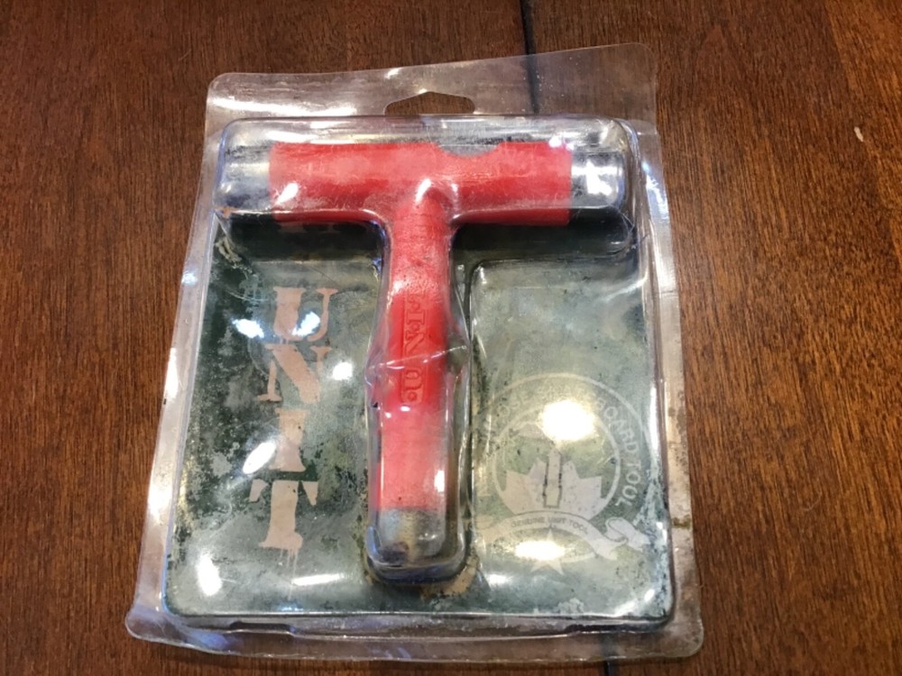 unit all purpose skateboard tool New in package red