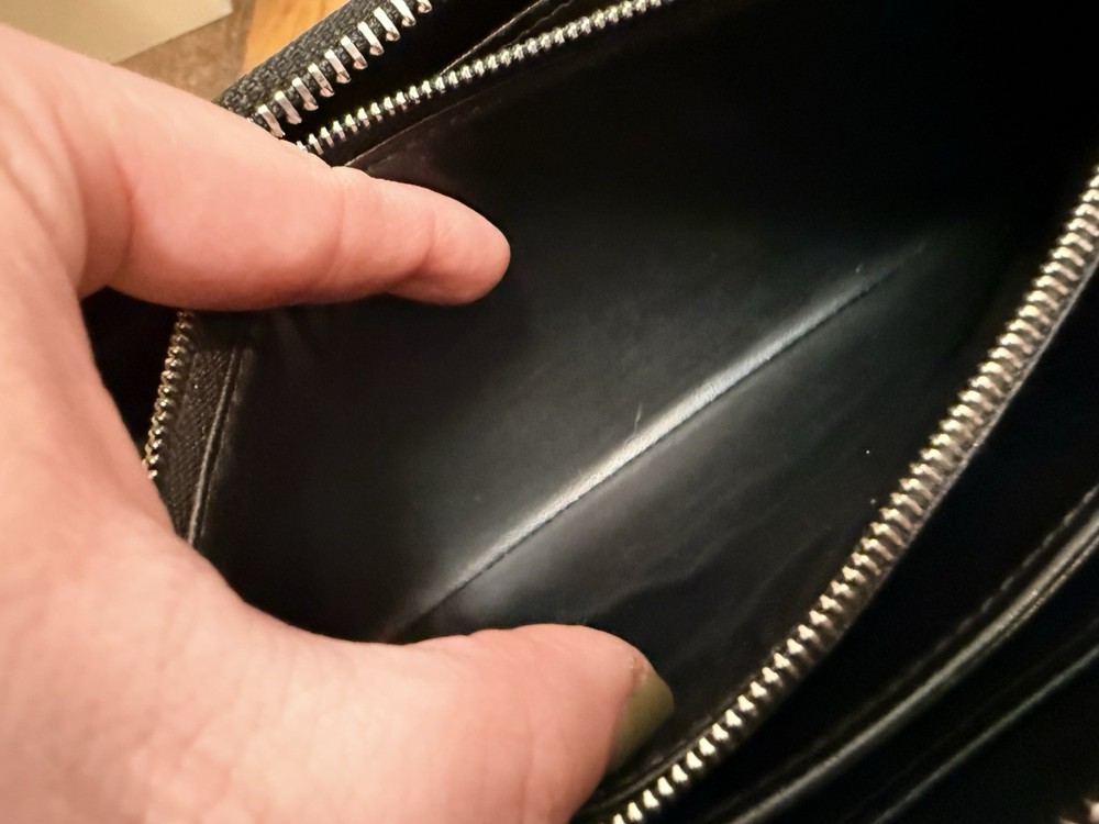 Authentic Louis Vuitton - Black Leather Zippy Wallet.