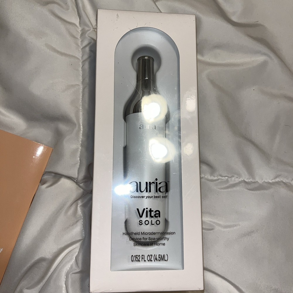 Auria Handheld Microdermabrasion Device