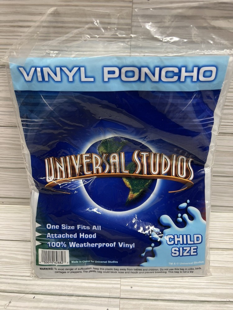 NEW ~ Vinyl Poncho Universal Studios CHILD Size w/ attached hood Rain Gear