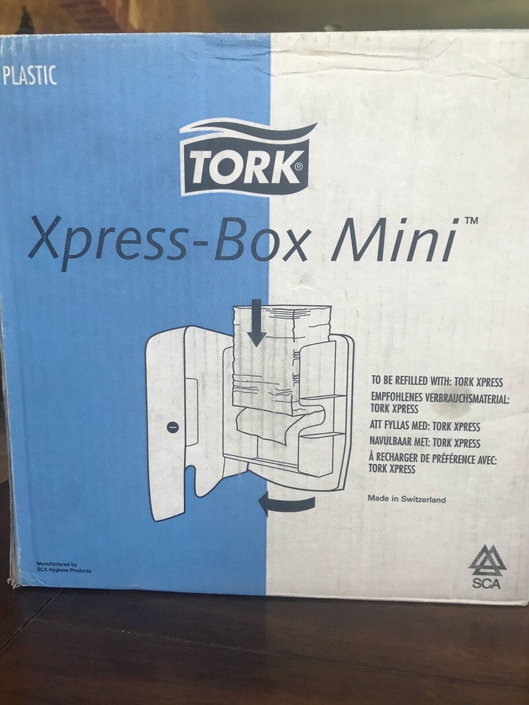 The Tork Xpress® Box Mini Hand Towel Dispenser