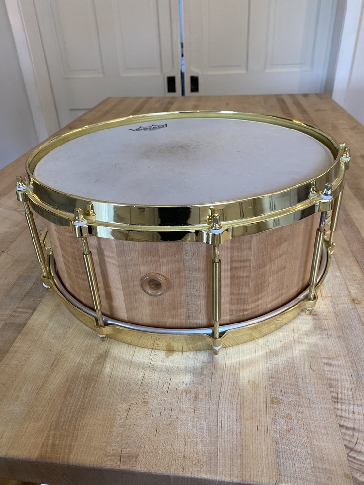 5 1/2 x 14 Custom made snare drum. Curly Maple Stave shell.