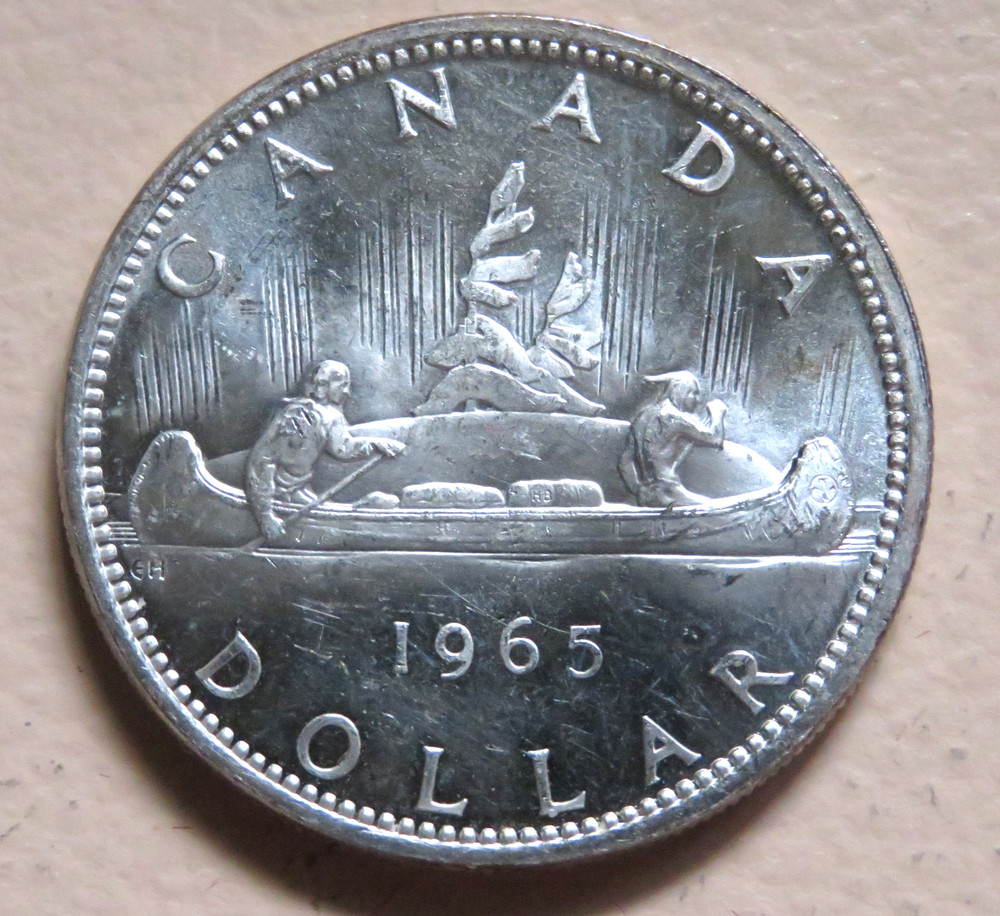Canada. 1965 Silver - 1 Dollar..  intermediate beads, blunt 5..   BU