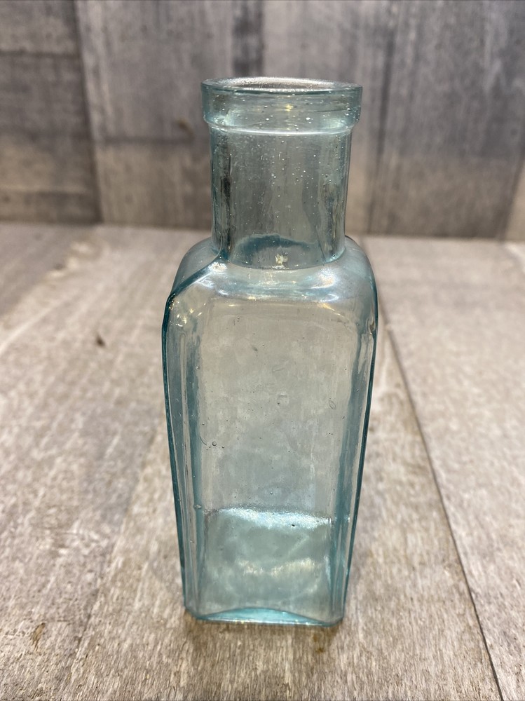 Vintage 5” light blue glass bottle