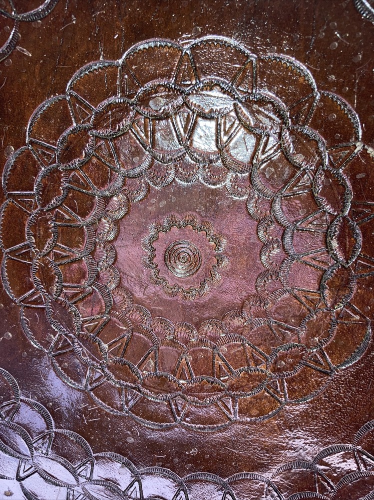 vintage embossed circular 12” leather piece