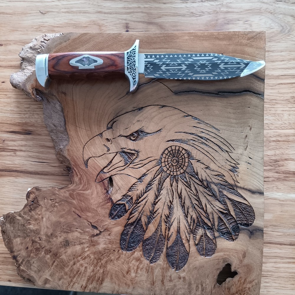 engraved knife on engraved wooddn plaque