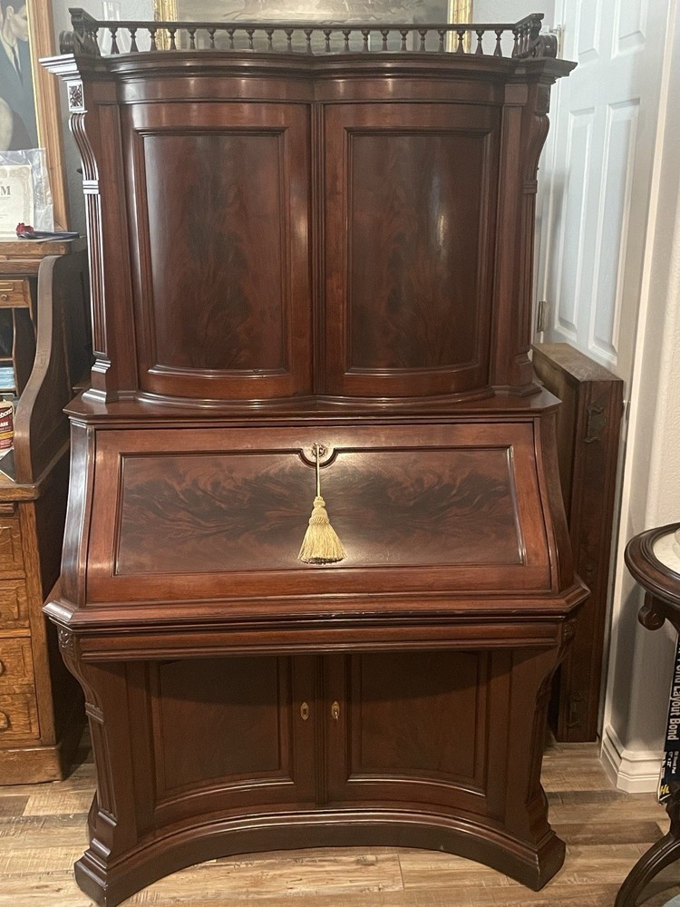 FLAME MAHOGANY DROP FRONT MECHANICAL DESK, ATTR. HERTER