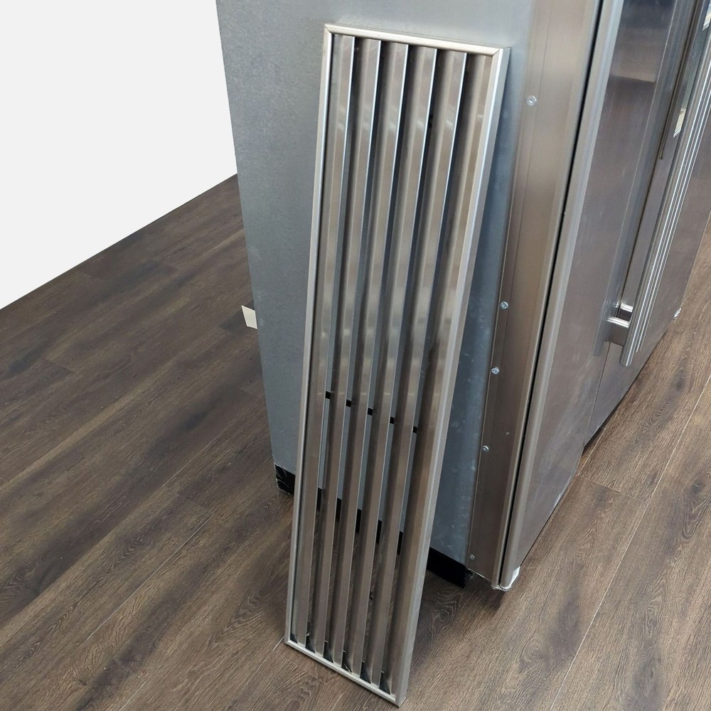 Sub-Zero Stainless Steel Side-by-Side Refrigerator with Ice Dispenser