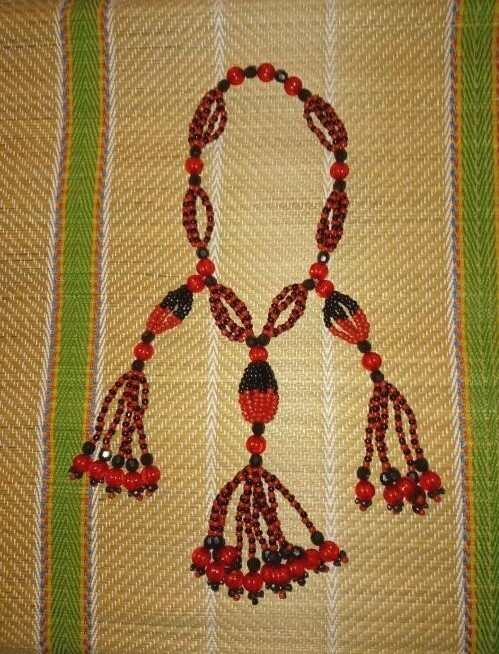 COLLAR DE RETROVISOR DE CARRO DE ELEGUA ( SANTERIA Y IFA )