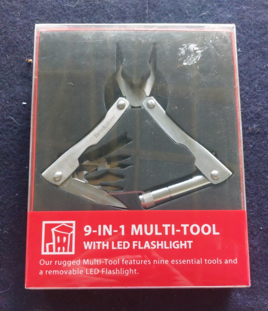 Brookstone® 9-in-1 multi-tool with flashlight pocket size tool NIB