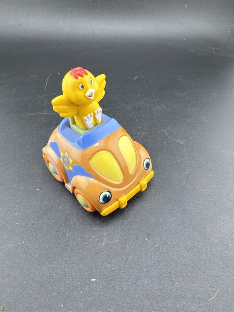 Chick Rides a  Compact Car Pull Release Toy, 2.5” tall