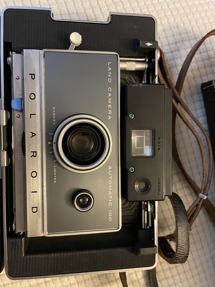 Vintage Polarid 100 with flash and case not tested see note