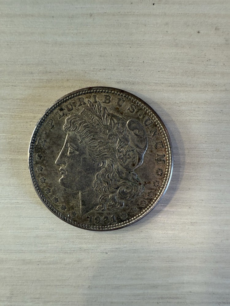 1921 and 1885 Morgan Silver Dollars