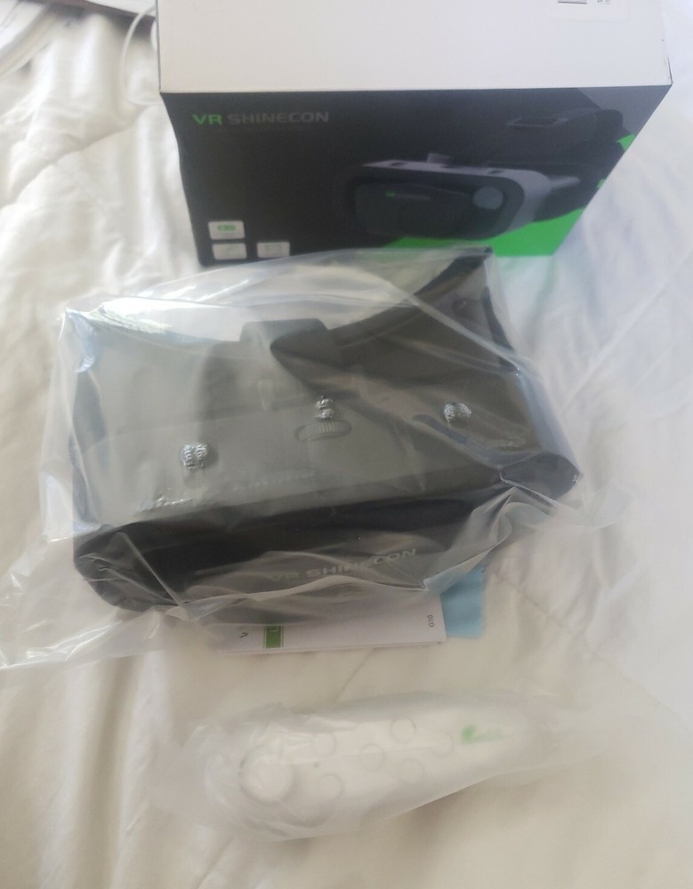 Virtual Reality Headset- Adjustable Glasses 7.2in.( with controller)