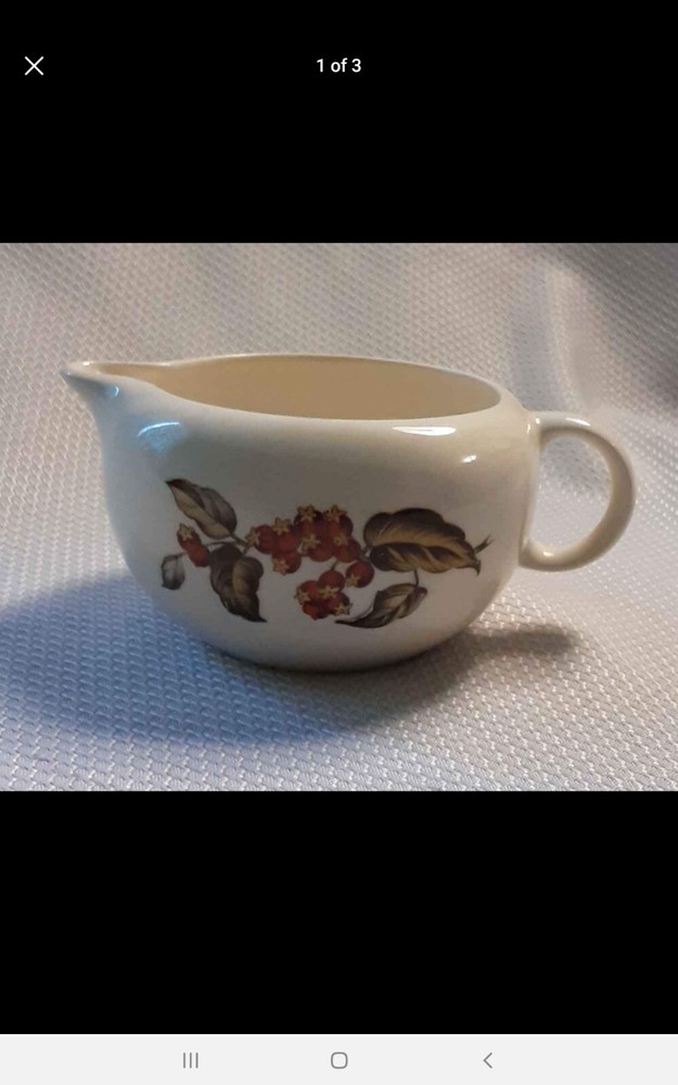 Cranberry ceramic creamer
