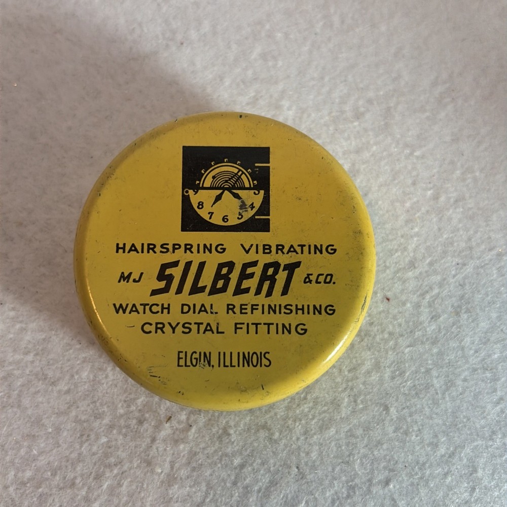 1950’s Silvery Watch Tin Container 2 Inch Diameter