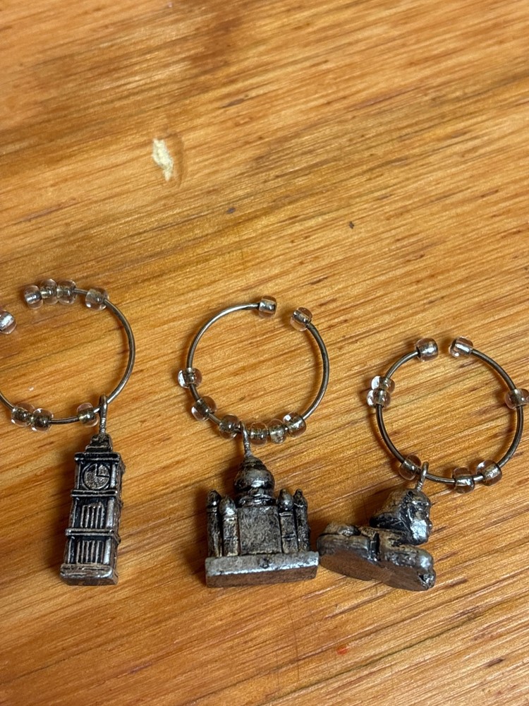 Wine charms and bottle openers