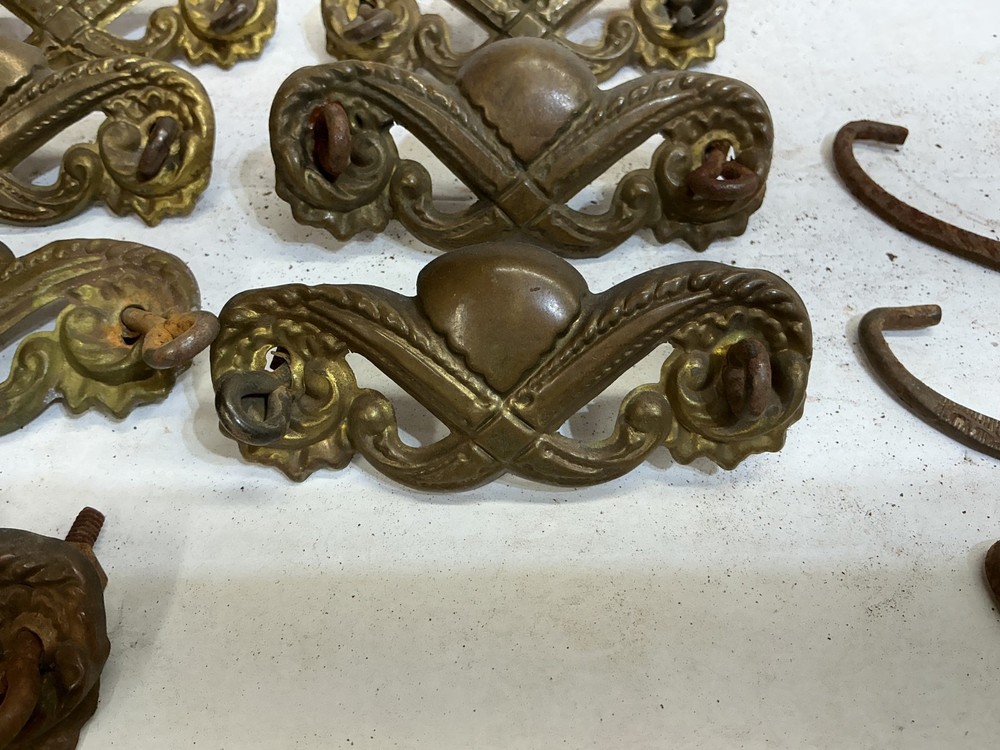 7 VINTAGE STAMPED BRASS DRAWER PULLS