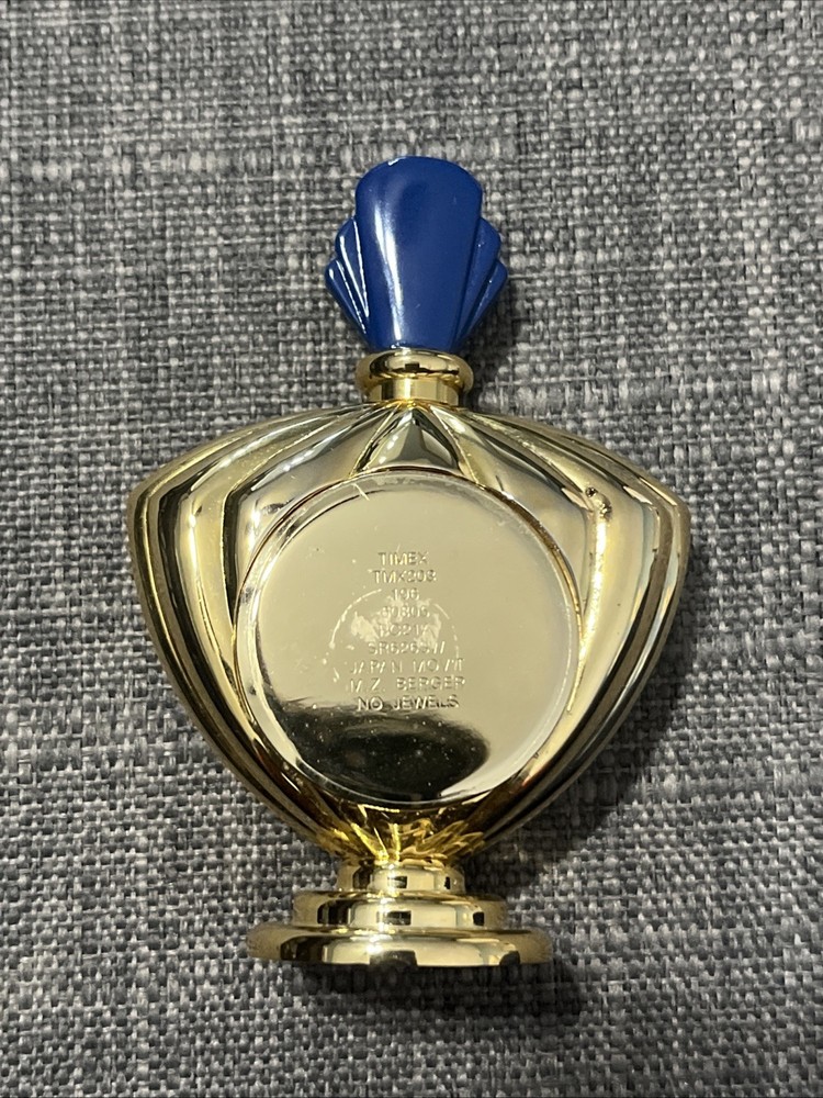 Vintage Timex Perfume Bottle Clock