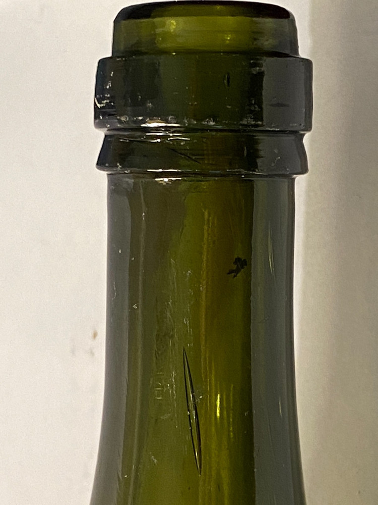 Antique Green bottle#1 BLOWN, SPUN MOLD, APPLIED TOP, PUNT BOTTOM