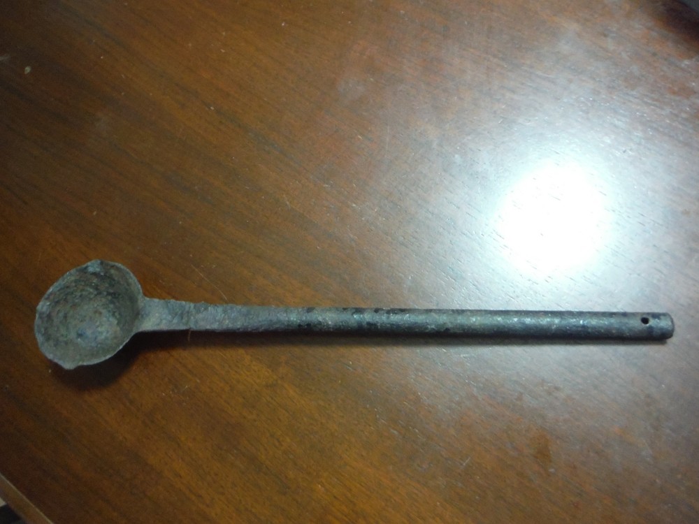vintage huge metal spoon