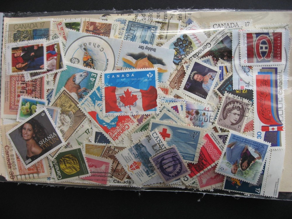 Canada colossal mixture (duplicates, mixed cond) 10000 35% comems, 65% defins