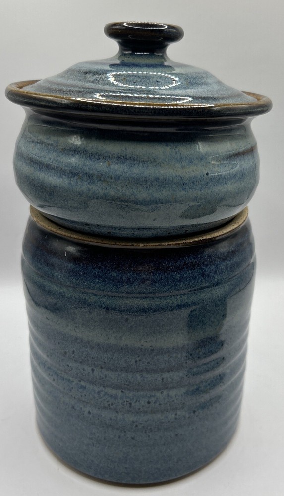 Pottery canisters set of 2 Signed Garnett