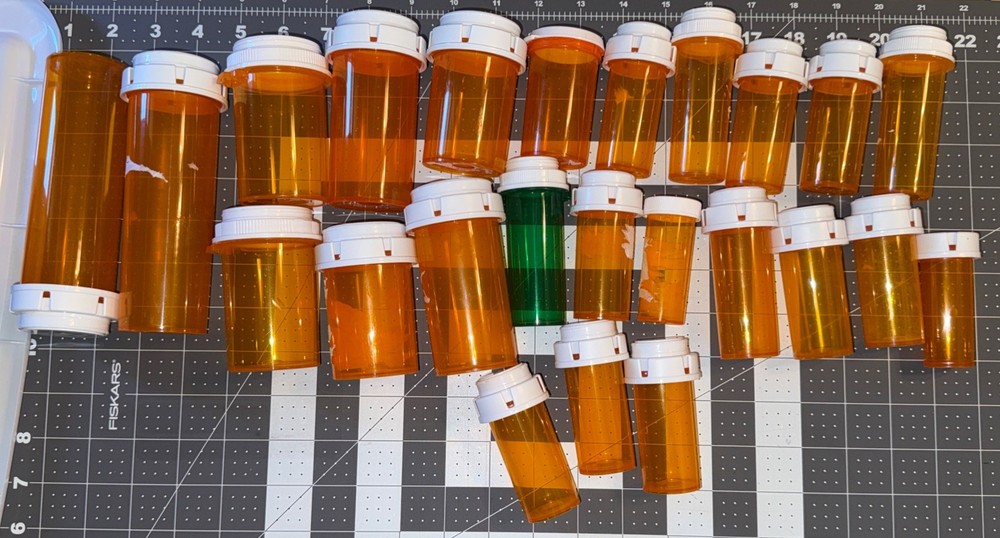 Empty medicine bottles, Lot 24, Various Sizes.