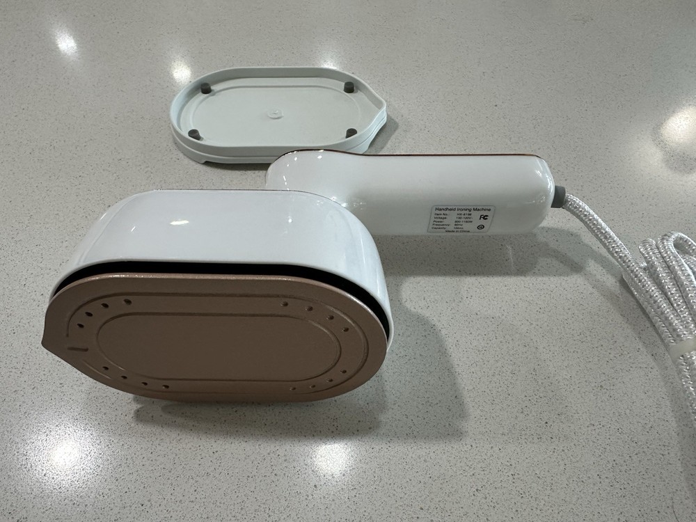 Handheld Steaming And Ironing Machine.