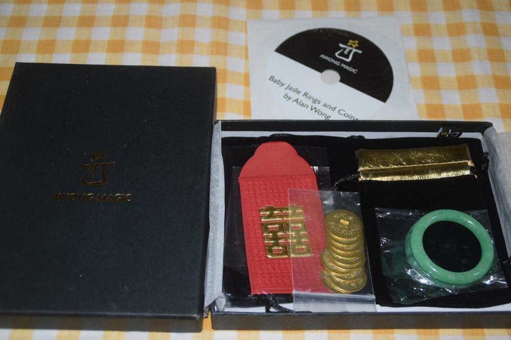 Second hand magic tricksB424 Baby Jade Rings and Coins