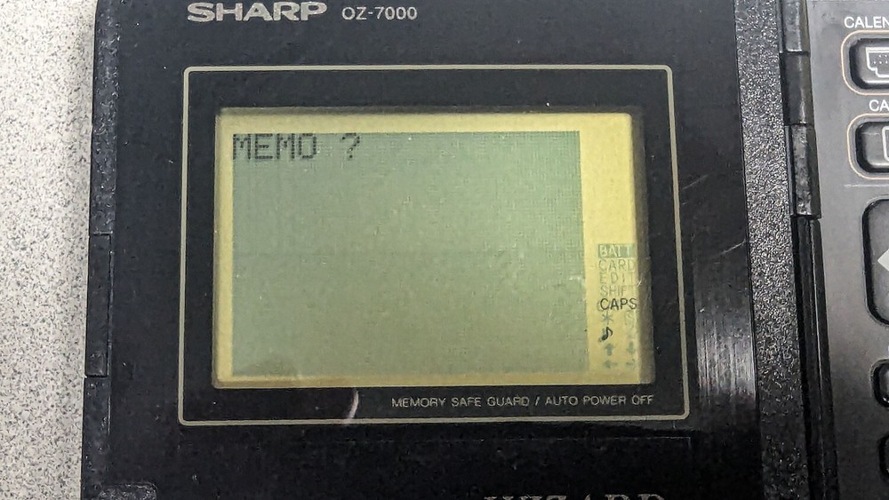 Sharp Wizard OZ-7000 Electronic Organizer with Time & Expense Manager Card