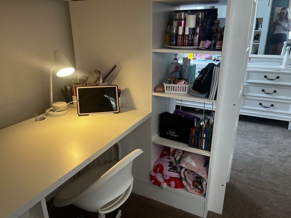 ikea loft bed with extra shelving and desk