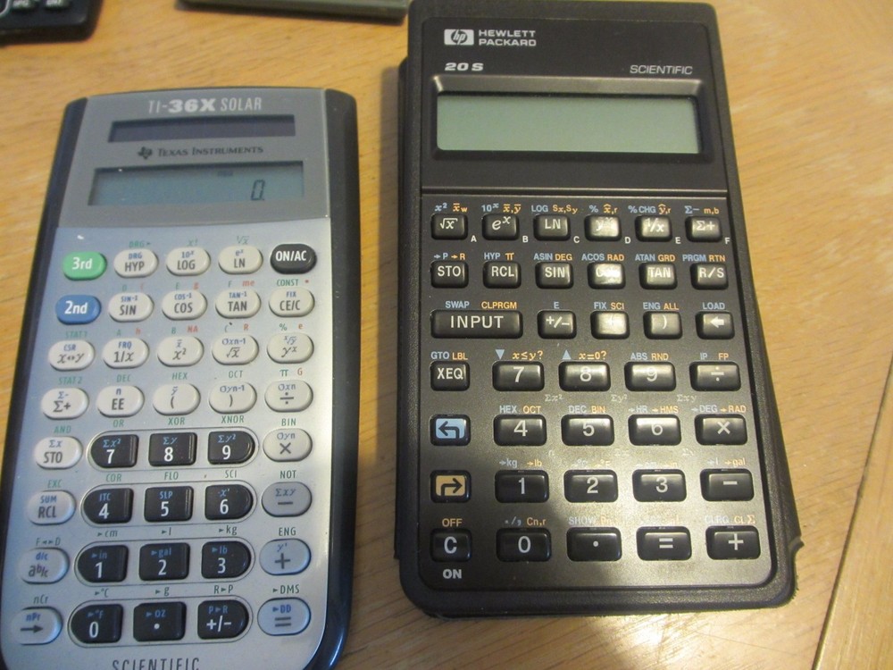 7 Calculators - Scientific - HP - Sharp - Texas Instruments - TI . quantity 7
