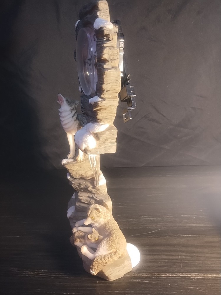 wolf clock missing ear and ice