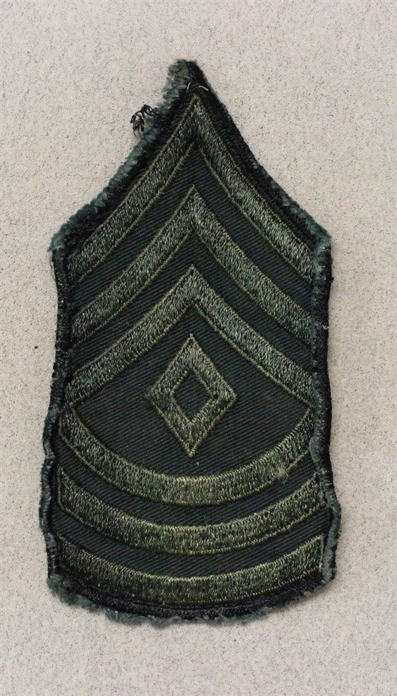 Army Chevron 1721: First Sergeant, single - subdued (dyed black), VN era