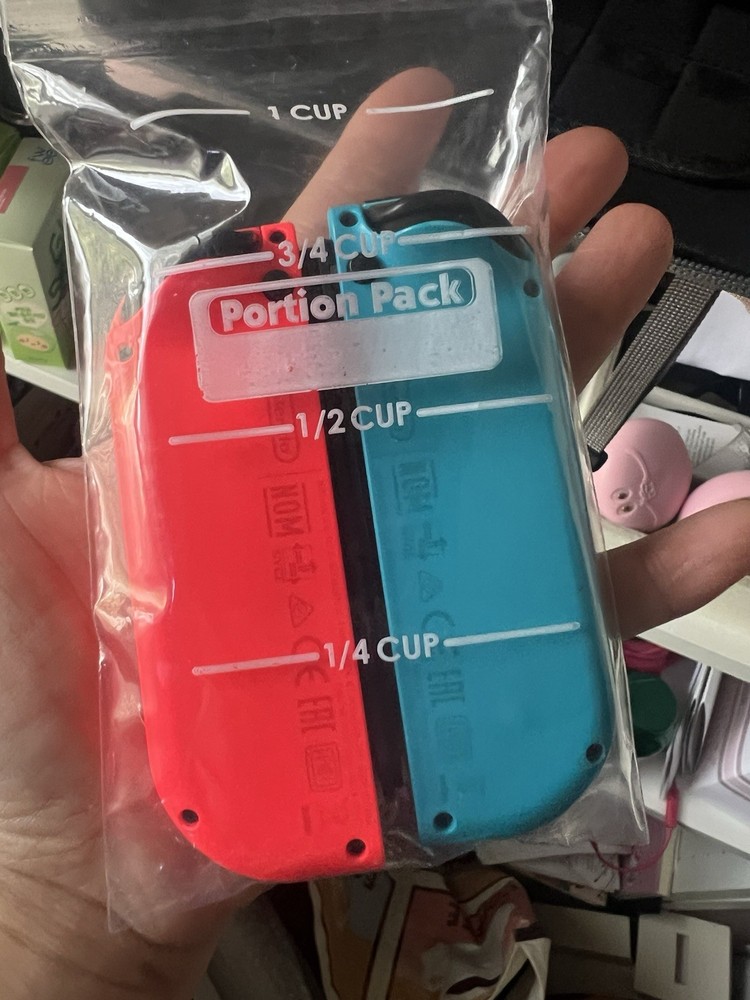 Nintendo Switch Console w/ Joy-Con, Grip, tomtoc Case, Thumb Grips