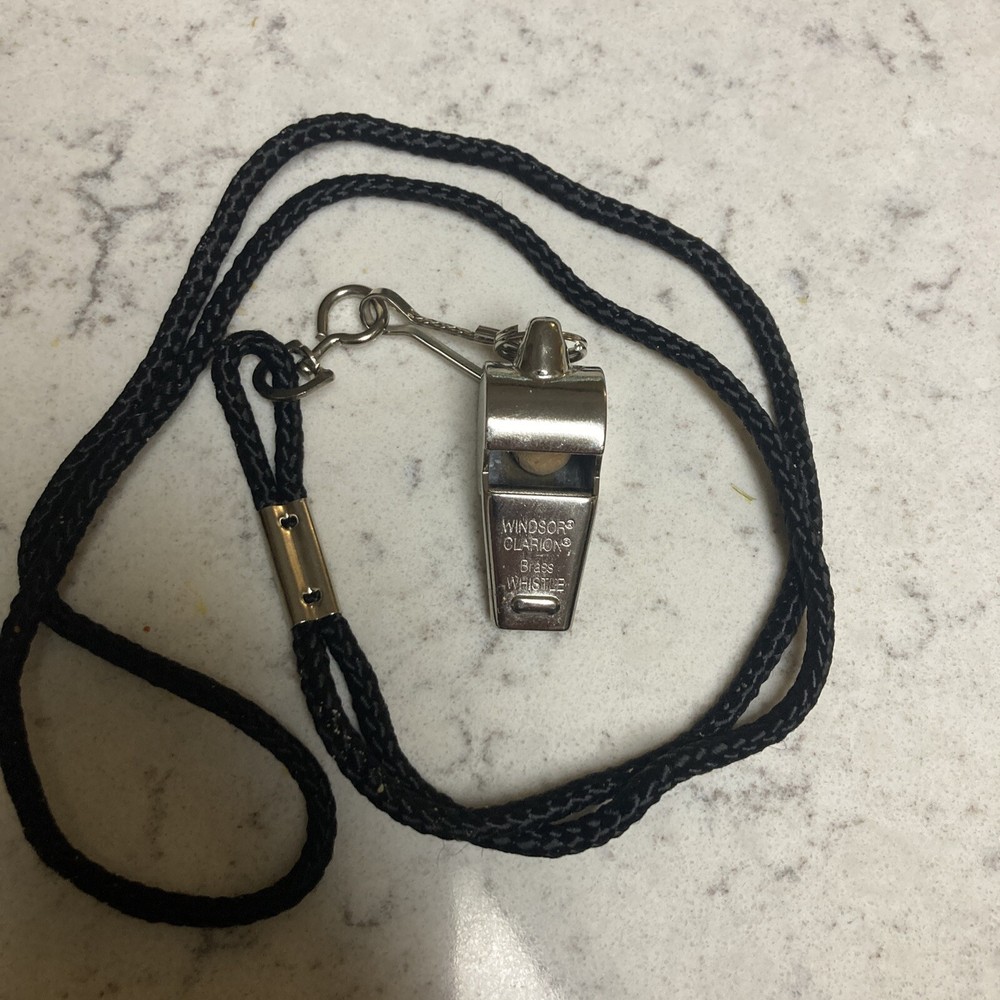 WHISTLE:  WINDSOR CLARION BRASS  WHISTLE  WITH  BLACK LANYARD(nice Condition)